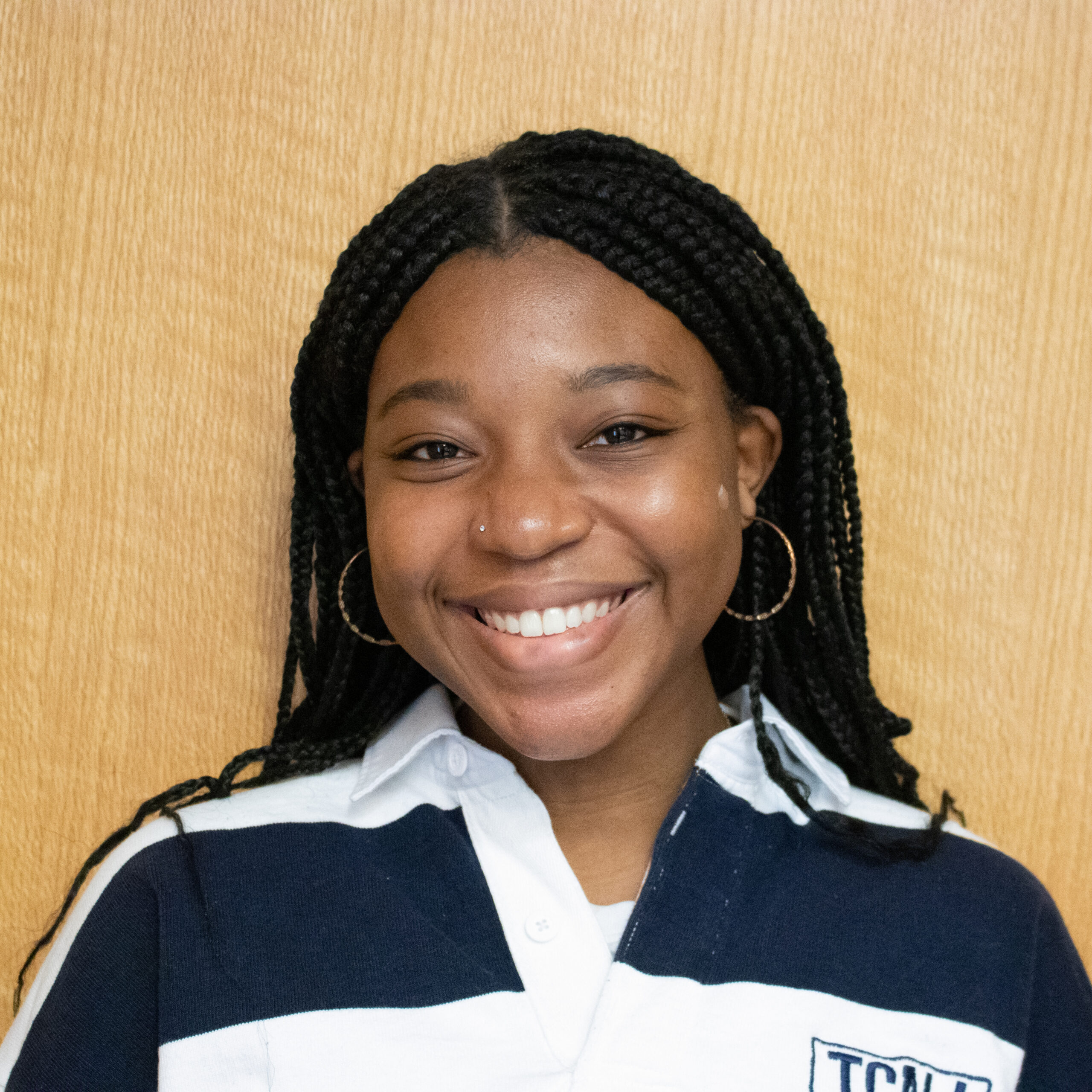 Headshot of Caitlin Mbuakoto